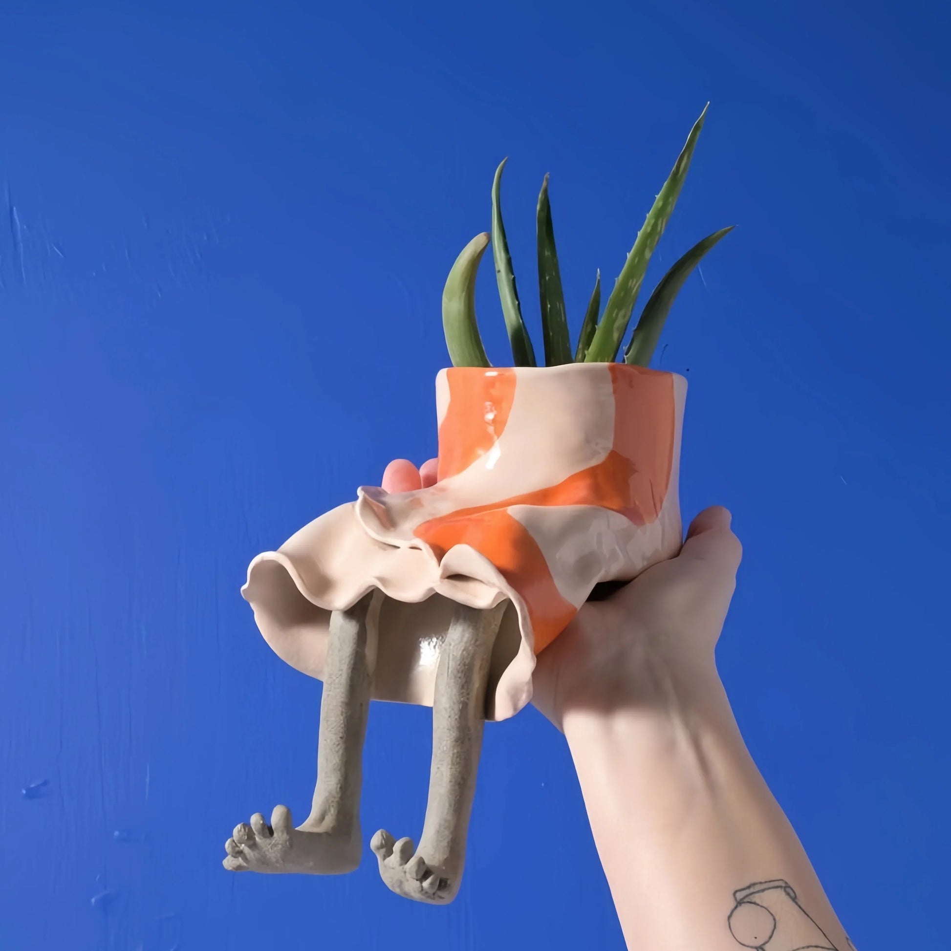 Outdoor Creative Sitting Planter Collection for Garden Display