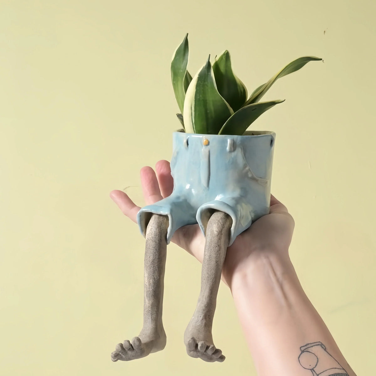 Outdoor Creative Sitting Planter Collection for Garden Display